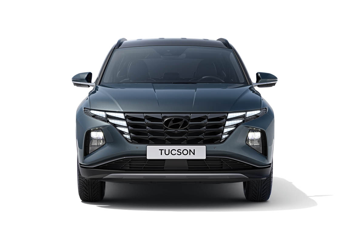 zu sehen ist ein blauer Hyundai TUCSON von vorne